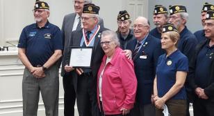 Matthews mayor Higdon awards Veteran of the Year plaque to Greg Smith of Post 235 