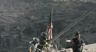 My photo of flag being raised at Ground Zero