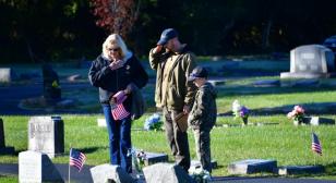 Northeast Post 630 places flags on veterans' graves
