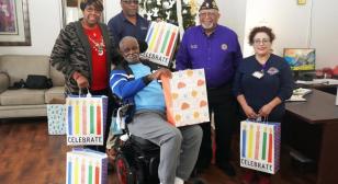 Fred Brock Post 828 donates pajamas and socks to elderly in nursing home
