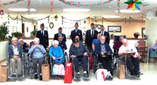 Illinois post honors shut-in vets at nursing home.