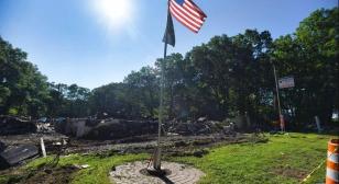 Lake Hopatcong (N.J.) post clearing the ashes to begin rebuilding