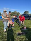 Placing flags at veterans' graves for Memorial Day weekend with Braxton-Perkins American Legion Post 25 and others