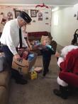Santa and Twisp Post 143 help make a family's Christmas