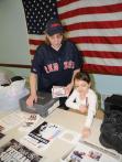 Mother helping daughter to honor Veterans