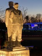 County comes out for candlelight vigil for homeless veterans on longest night of the year at nation's only homeless veterans statue