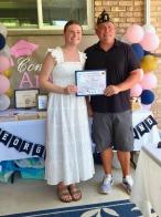 Warrior awards scholarship to former Poppy Princess who became a rose