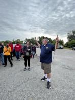 Placing U.S. flags at veterans' graves Memorial Day weekend