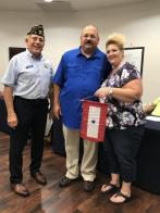 Post 21 presents Blue Star Banner to proud parents