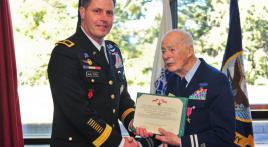 Colonel uses his retirement ceremony to honor World War II veteran