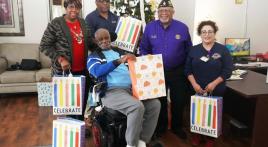 Fred Brock Post 828 donates pajamas and socks to elderly in nursing home