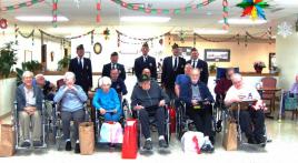 Illinois post honors shut-in vets at nursing home.