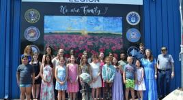 Elementary students paint mural for local post