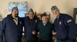 Squadron 440 presents garrison cap to Korean War veteran