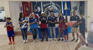 Post 67 (Rincón, Inc., Puerto Rico) supporting children, youth soccer team