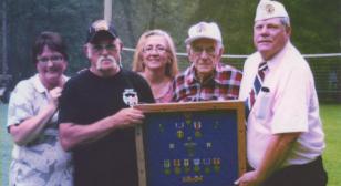 World War II vet receives medals earned in combat on 90th birthday