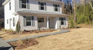 Veterans help Afghanistan veteran translator build Habitat home for him and his family