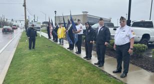 American Legion escorts the remains of a recently identified sailor who was killed in the bombing of Pearl Harbor