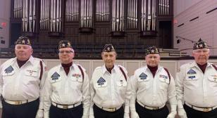 Peter J. Courcy Post 178 honor guard performs military honors for honorary life member