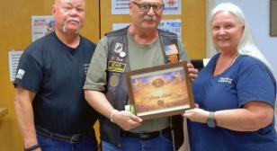 John J. Morris Post 62 presents Lary Tank with Stars of 62 Award