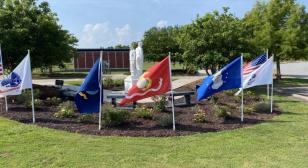 Local veterans team with Home Depot Foundation to clean nation's only homeless statue ahead of July 4 celebration