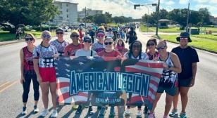 Elements of American Legion Post OK28 participate in Veterans Day parade