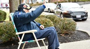 Drive-by birthday parade for 101-year-old World War II veteran