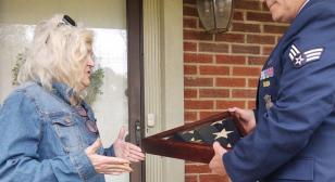 Persistence solves mystery of WWI funeral flag returned to family