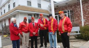 Presenting a Marine Corps Jacket to an Iwo Jima Survivor