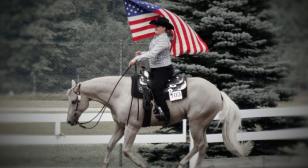 Granddaughter carries American flag