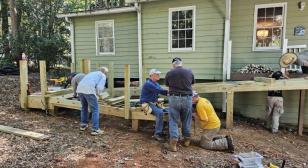 Veterans come out to help build ramps for Afghanistan Army Veteran and Vietnam Air Force Veteran